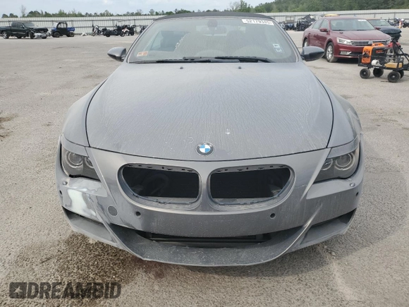 2007 BMW 6 Series M6 z VIN WBSEK93557CY78648, wystawiony jako Copart lot #52179345 z przebiegiem 22 453 mil mil oraz Szkoda całkowita • Salvage title. Historia ofert i sprzedaży dostępna na DreamBid. Obrazek 5.