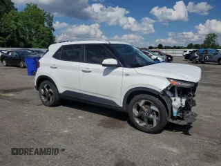 2021 Hyundai Venue Denim with VIN KMHRC8A38MU064478, listed as a Copart auction lot 57478725 with 57,161 mi miles and Salvage title. Bid and sale history available at DreamBid. Image 4.
