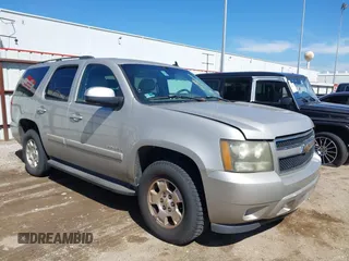 2008 Chevrolet Tahoe LTZ with VIN 1GNFC13J58R116109, listed as a IAAI auction lot 41670450 with 245,182 mi miles and . Bid and sale history available at DreamBid. Image 1.