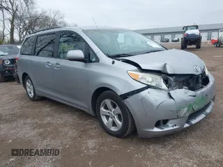 2011 Toyota Sienna LE AAS with VIN 5TDKK3DC4BS085658, listed as a IAAI auction lot 41966742 with 276,899 mi miles. Bid and sale history available at carsss.com. Image 1.