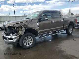 2017 Ford F-250 Lariat z VIN 1FT7W2BT1HEB61648, wystawiony jako Copart lot #49853735 z przebiegiem 84 719 mil mil oraz Szkoda całkowita • Salvage title. Historia ofert i sprzedaży dostępna na DreamBid. Obrazek 1.