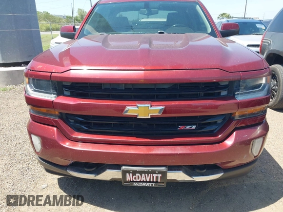 2017 Chevrolet Silverado 1500 LT with VIN 3GCUKREC8HG259071, listed as a IAAI auction lot 42078117 with 158,606 mi miles and . Bid and sale history available at DreamBid. Image 12.
