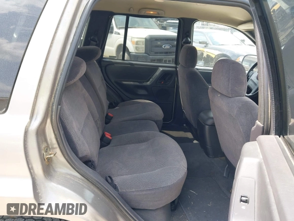 1999 Jeep Grand Cherokee Laredo с VIN 1J4G258S2XC619584, выставлен на аукционе IAAI как лот 42095870 с пробегом 115 941 миль миль и . История ставок и продаж доступна на DreamBid. Изображение 8.