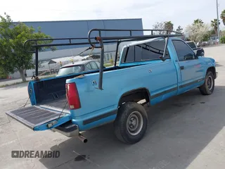1993 GMC Sierra 1500 with VIN 1GTDC14H3PE518180, listed as a IAAI auction lot 41837262 with 380,405 mi miles and . Bid and sale history available at DreamBid. Image 4.