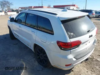 2017 Jeep Grand Cherokee Laredo with VIN 1C4RJEAG4HC952779, listed as a IAAI auction lot 41692543 with 138,062 mi miles and . Bid and sale history available at DreamBid. Image 3.