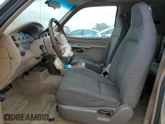 2002 Ford Explorer Sport Value with VIN 1FMYU60EX2UC31677, listed as a Copart auction lot 46415785 with 104,684 mi miles and Salvage title. Bid and sale history available at DreamBid. Image 7.