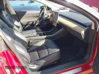 2018 Tesla Model 3 Long Range Battery z VIN 5YJ3E1EA3JF047287, wystawiony jako IAAI lot #42099771 z przebiegiem 120 470 mil mil oraz . Historia ofert i sprzedaży dostępna na DreamBid. Obrazek 5.