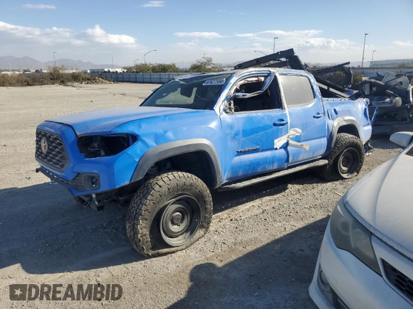 2020 Toyota Tacoma SR5 z VIN 3TMCZ5AN6LM310164, wystawiony jako Copart lot #47098995 z przebiegiem 18 285 mil mil oraz Szkoda całkowita • Salvage title. Historia ofert i sprzedaży dostępna na DreamBid. Obrazek 1.