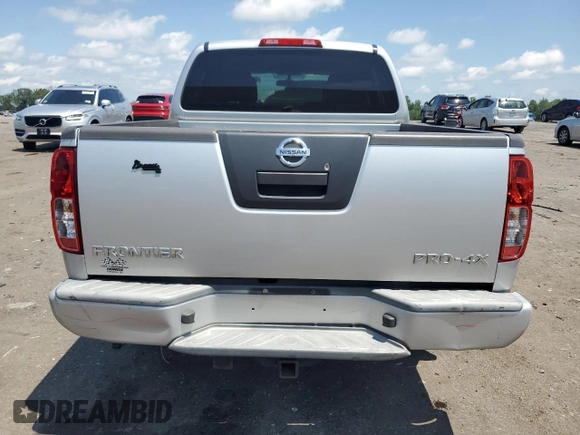2010 Nissan Frontier Pro-4X with VIN 1N6AD0EV5AC435641, listed as a Copart auction lot 63388025 with 84,349 mi miles and Salvage title. Bid and sale history available at DreamBid. Image 6.
