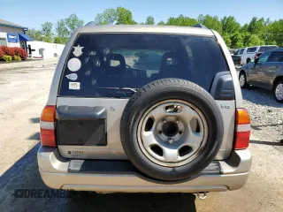 2002 Suzuki XL7 Standard z VIN JS3TY92V524108548, wystawiony jako Copart lot #56304705 z przebiegiem 288 201 mil mil oraz Nie do naprawy • Non repairable. Historia ofert i sprzedaży dostępna na DreamBid. Obrazek 6.