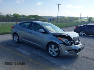 2012 Hyundai Elantra GLS z VIN KMHDH4AE9CU330529, wystawiony jako IAAI lot #42077430 z przebiegiem 150 574 mil mil oraz . Historia ofert i sprzedaży dostępna na DreamBid. Obrazek 1.