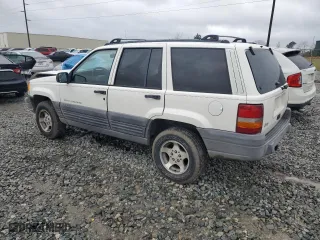 1997 Jeep Grand Cherokee TSi with VIN 1J4FX58S0VC578818, listed as a Copart auction lot 48463795 with 133,200 mi miles and Salvage Title. Bid and sale history available at carsss.com. Image 2.