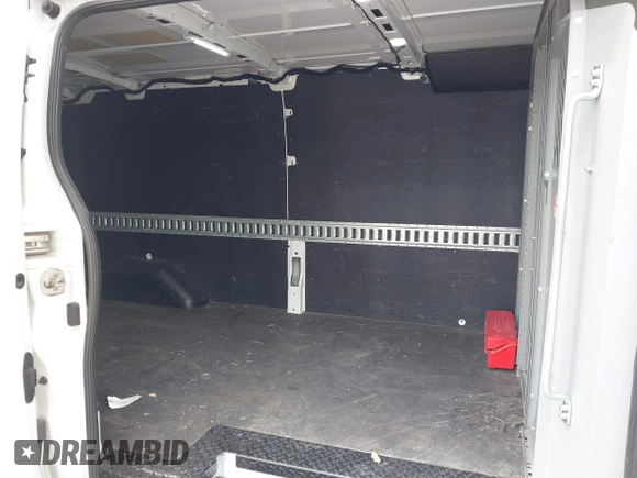 2023 Ford Transit Cargo with VIN 1FTBR1Y82PKA22661, listed as a IAAI auction lot 41768039 with 30,800 mi miles and . Bid and sale history available at DreamBid. Image 8.