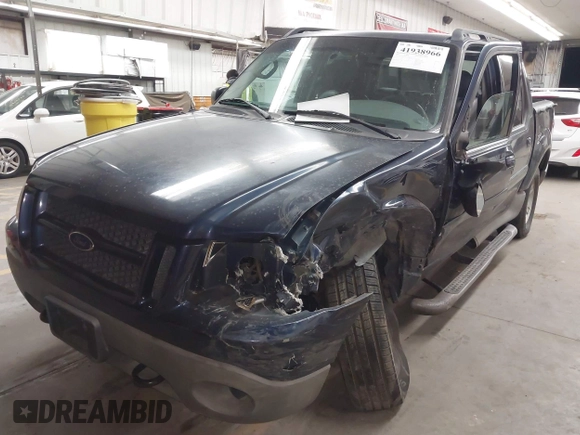 2003 Ford Explorer Sport Trac XLS z VIN 1FMDU77E03UC07089, wystawiony jako IAAI lot #41938966 z przebiegiem 128 982 mil mil oraz . Historia ofert i sprzedaży dostępna na DreamBid. Obrazek 2.