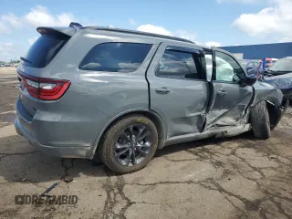 2025 Dodge Durango GT Plus with VIN 1C4RDJDG7SC503972, listed as a Copart auction lot 56074765 with 7,104 mi miles and Salvage title. Bid and sale history available at DreamBid. Image 3.