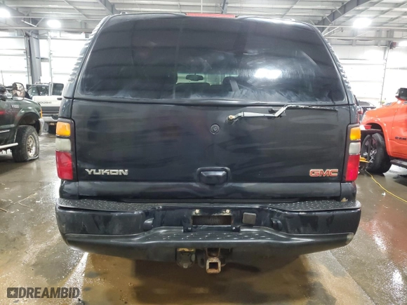 2005 GMC Yukon Denali with VIN 1GKEK63U55J131884, listed as a Copart auction lot 71272974 with 319,162 mi miles and Salvage Title. Bid and sale history available at carsss.com. Image 6.