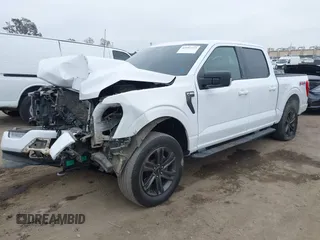 2022 Ford F-150 XL with VIN 1FTFW1E57NKE14424, listed as a IAAI auction lot 42097712 with 56,879 mi miles and . Bid and sale history available at DreamBid. Image 2.