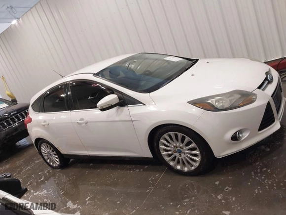 2012 Ford Focus Titanium with VIN 1FAHP3N26CL122364, listed as a IAAI auction lot 41777664 with NaN miles. Bid and sale history available at carsss.com. Image 13.