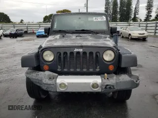 2009 Jeep Wrangler Sahara with VIN 1J4FA54109L702963, listed as a Copart auction lot 89211555 with 125,138 mi miles and Clean title. Bid and sale history available at DreamBid. Image 5.