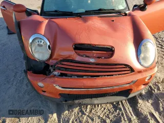 2007 MINI Convertible S with VIN WMWRH33587TJ43499, listed as a Copart auction lot 76266684 with 103,691 mi miles and Salvage title. Bid and sale history available at DreamBid. Image 12.