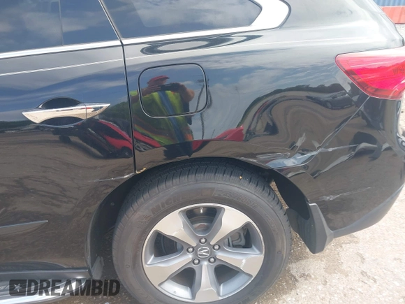 2014 Acura MDX with VIN 5FRYD4H25EB012088, listed as a IAAI auction lot 42510135 with 81,786 mi miles and . Bid and sale history available at DreamBid. Image 17.