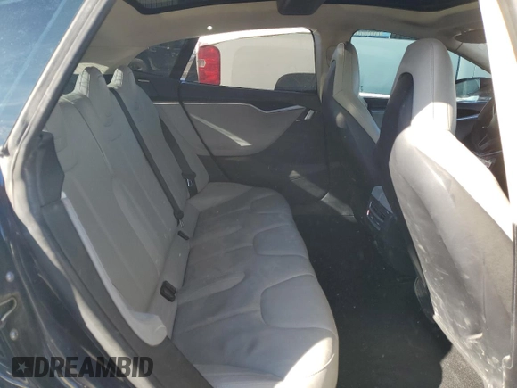 2013 Tesla Model S with VIN 5YJSA1CN9DFP05499, listed as a Copart auction lot 80078144 with 133,763 mi miles and Salvage Title. Bid and sale history available at carsss.com. Image 10.
