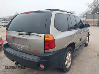 2002 GMC Envoy SLT with VIN 1GKDT13S522420800, listed as a IAAI auction lot 41624195 with 255,745 mi miles. Bid and sale history available at carsss.com. Image 4.