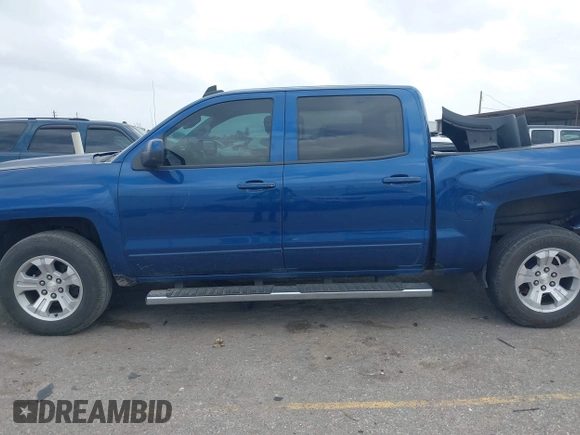 2017 Chevrolet Silverado 1500 LT with VIN 3GCUKREC8HG462719, listed as a IAAI auction lot 41940176 with 380,676 mi miles and . Bid and sale history available at DreamBid. Image 14.