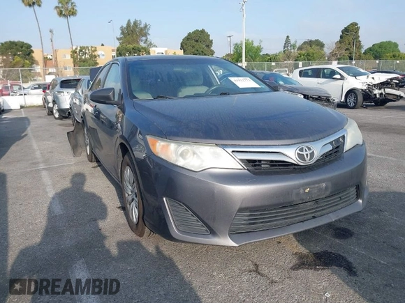 2014 Toyota Camry L with VIN 4T4BF1FK7ER430132, listed as a IAAI auction lot 41912773 with 215,073 mi miles. Bid and sale history available at carsss.com. Image 1.
