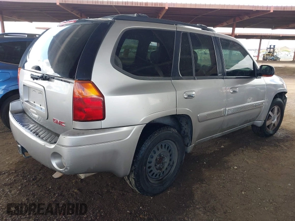 2004 GMC Envoy SLT with VIN 1GKDS13S942267554, listed as a IAAI auction lot 41754066 with 178,895 mi miles. Bid and sale history available at carsss.com. Image 4.