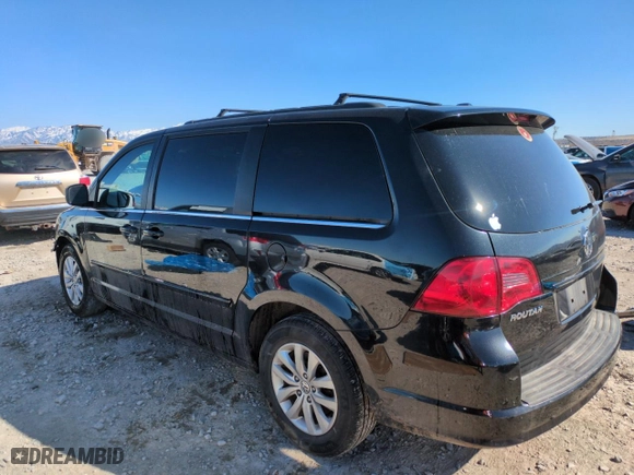 2012 Volkswagen Routan SE with VIN 2C4RVABG0CR146143, listed as a Copart auction lot 50765305 with 127,969 mi miles and Salvage Title. Bid and sale history available at carsss.com. Image 2.