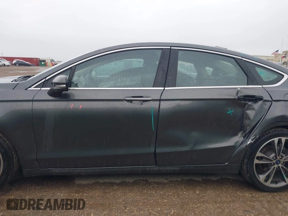2020 Ford Fusion Titanium with VIN 3FA6P0K97LR192657, listed as a IAAI auction lot 42170258 with 87,696 mi miles and . Bid and sale history available at DreamBid. Image 15.