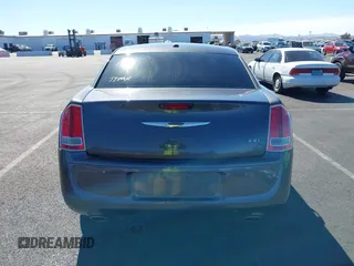 2013 Chrysler 300 with VIN 2C3CCABT4DH644186, listed as a IAAI auction lot 41693442 with 102,802 mi miles. Bid and sale history available at carsss.com. Image 16.