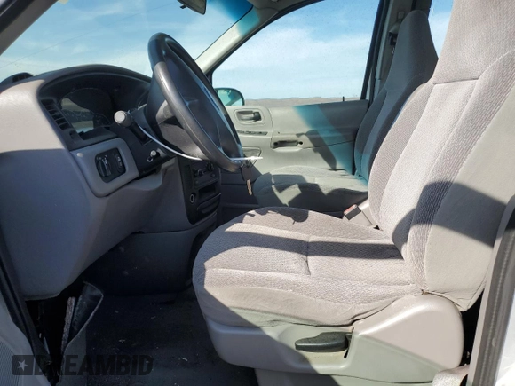 2003 Ford Windstar with VIN 2FMZA50453BA62156, listed as a Copart auction lot 76044664 with 85,706 mi miles and Salvage Title. Bid and sale history available at carsss.com. Image 7.