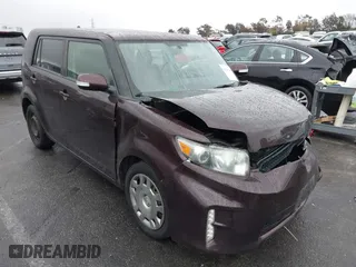 2015 Scion xB with VIN JTLZE4FE7FJ068936, listed as a IAAI auction lot 41565886 with 94,671 mi miles. Bid and sale history available at carsss.com. Image 1.