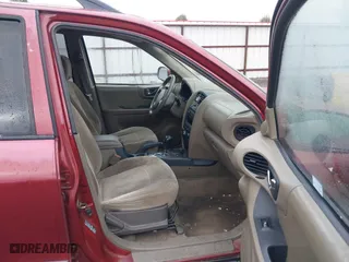 2004 Hyundai Santa Fe GLS with VIN KM8SC73DX4U640640, listed as a IAAI auction lot 41803501 with 149,924 mi miles. Bid and sale history available at carsss.com. Image 5.