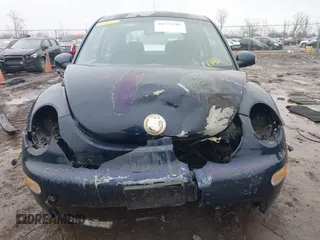 2003 Volkswagen New Beetle Coupe GL with VIN 3VWBK21C03M437759, listed as a IAAI auction lot 41573282 with 73,493 mi miles. Bid and sale history available at carsss.com. Image 13.