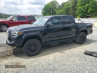 2021 Toyota Tacoma SR z VIN 5TFCZ5AN8MX246821, wystawiony jako Copart lot #54615175 z przebiegiem 63 632 mil mil oraz Szkoda całkowita • Salvage title. Historia ofert i sprzedaży dostępna na DreamBid. Obrazek 1.