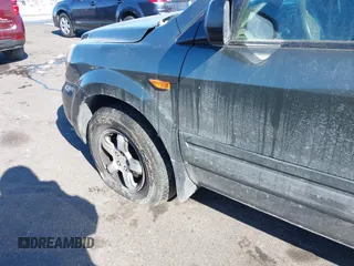 2006 Honda Pilot EX-L with VIN 5FNYF18596B016974, listed as a IAAI auction lot 41634049 with 161,687 mi miles and . Bid and sale history available at DreamBid. Image 12.