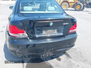 2011 BMW 1 Series 128i with VIN WBAUP9C51BVL90277, listed as a IAAI auction lot 42572690 with 153,427 mi miles and . Bid and sale history available at DreamBid. Image 6.