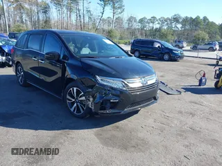 2018 Honda Odyssey Elite with VIN 5FNRL6H93JB099730, listed as a IAAI auction lot 41613342 with 80,409 mi miles and . Bid and sale history available at DreamBid. Image 1.