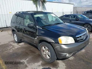 2004 Mazda Tribute LX with VIN 4F2CZ941X4KM29568, listed as a IAAI auction lot 41735353 with 285,989 mi miles and . Bid and sale history available at carsss.com. Image 13.