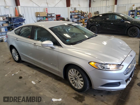 2015 Ford Fusion SE Hybrid with VIN 3FA6P0LU2FR149741, listed as a Copart auction lot 51973175 with 171,999 mi miles and Clean Title. Bid and sale history available at DreamBid. Image 4.