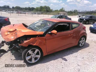 2012 Hyundai Veloster w/Gray Int z VIN KMHTC6AD7CU030176, wystawiony jako IAAI lot #36994035 z przebiegiem Nie podano mil oraz . Historia ofert i sprzedaży dostępna na DreamBid. Obrazek 2.
