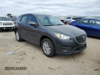 2016 Mazda CX-5 Sport with VIN JM3KE2BE8G0617663, listed as a Copart auction lot 54538385 with 202,806 mi miles and Non Repairable. Bid and sale history available at carsss.com. Image 4.