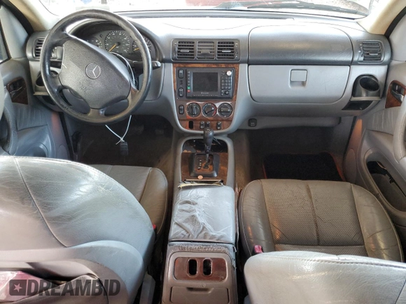 2000 Mercedes-Benz M-Class with VIN 4JGAB54E1YA193102, listed as a Copart auction lot 74294404 with 202,107 mi miles and Salvage Title. Bid and sale history available at carsss.com. Image 8.