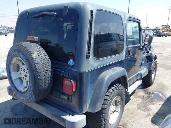 2001 Jeep Wrangler Sahara with VIN 1J4FA59SX1P337951, listed as a IAAI auction lot 42087134 with 154,479 mi miles and . Bid and sale history available at DreamBid. Image 4.