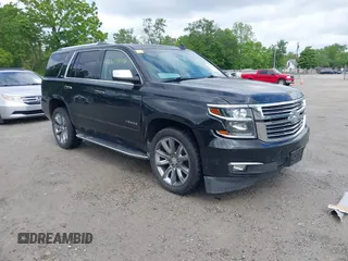 2015 Chevrolet Tahoe LTZ z VIN 1GNSKCKC4FR739217, wystawiony jako IAAI lot #42308808 z przebiegiem 110 673 mil mil oraz . Historia ofert i sprzedaży dostępna na DreamBid. Obrazek 1.