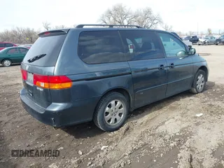 2003 Honda Odyssey EX-L with VIN 5FNRL18903B090800, listed as a IAAI auction lot 41843858 with 201,393 mi miles and . Bid and sale history available at DreamBid. Image 4.