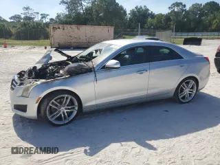 2014 Cadillac ATS Standard RWD z VIN 1G6AA5RX7E0156996, wystawiony jako Copart lot #57307335 z przebiegiem Nie podano mil oraz Szkoda całkowita • Salvage title. Historia ofert i sprzedaży dostępna na DreamBid. Obrazek 1.